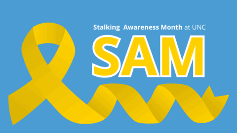 Yellow awareness ribbon on left side of image. Yellow text outlined with white that says, "SAM." White text above that says, "Stalking Awareness Month."